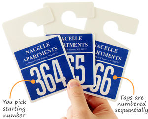 Blue parking permit hang tags with large numbers