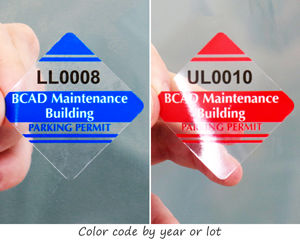 Color-coded parking permit stickers in a diamond shape