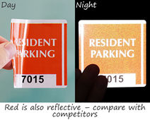 
	                                Translucent red of parking sticker is reflective, too!