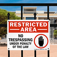 Restricted Area No Trespassing Under Penalty Sign