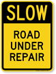 Road Under Repair Slow Down Sign